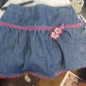 Cute blue jeans skort with burgundy trim & flower